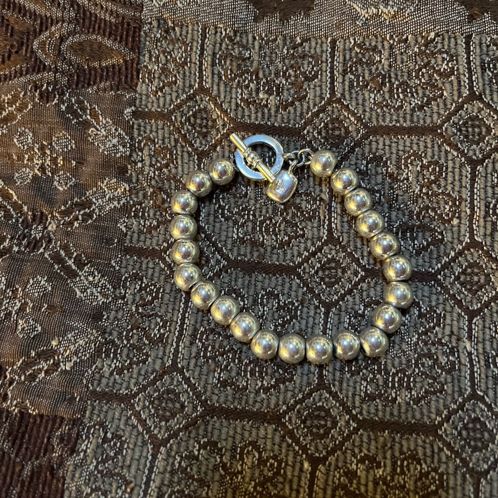 Lauren Ralph Lauren medium silver bead bracelet.